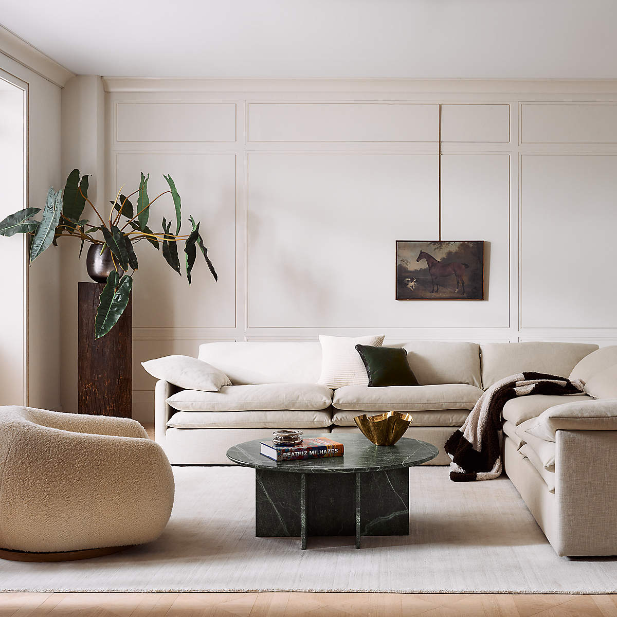 White neutral living room green coffee table