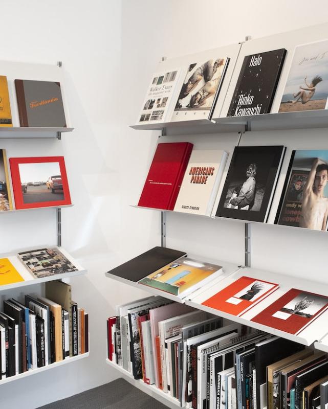 Coffee table books on the shelves of Blank Canvas Bookstore