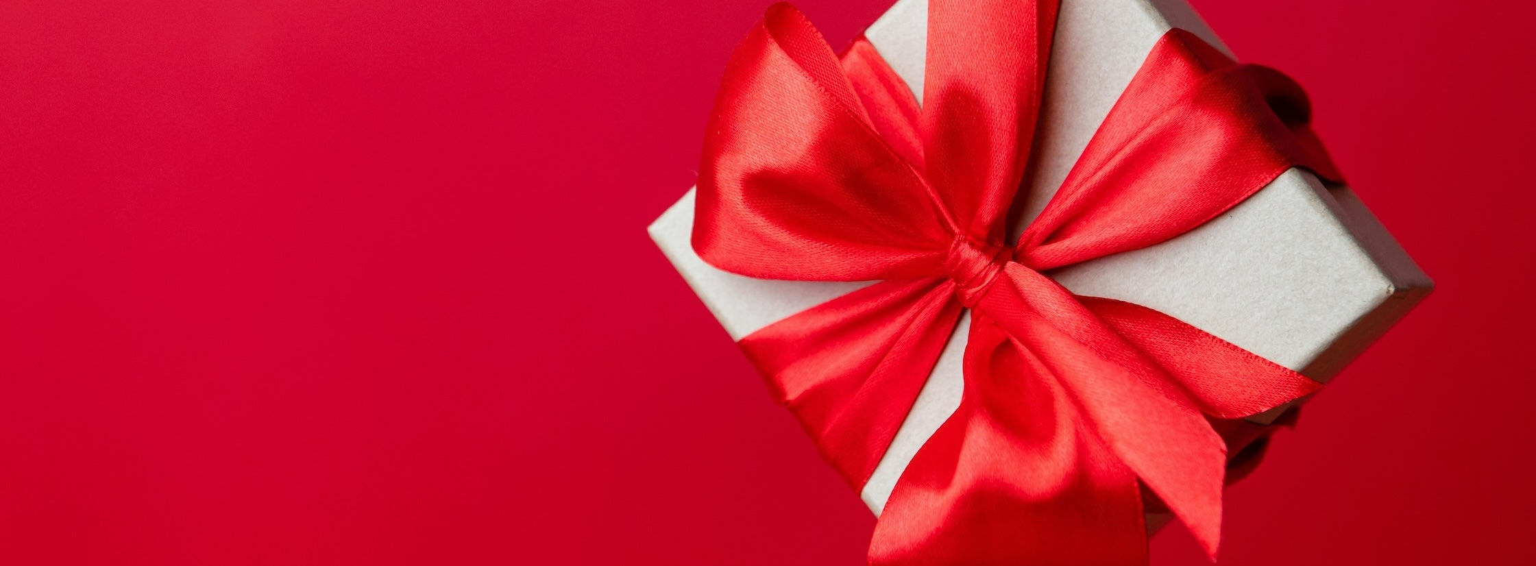 Wrapped gift on a red background