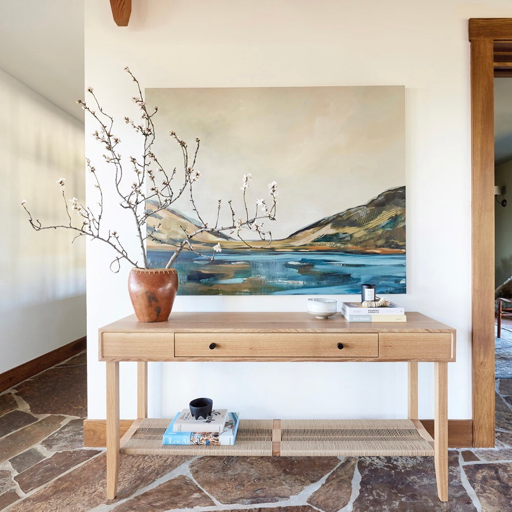 Modern wood sideboard with books